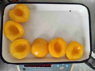 400g законсервировало желтый плод персика в упаковке консервной банки
